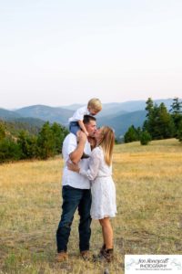 Littleton family photographer in Colorado at Mt. Falcon park mountain views view of foothills boy mother father son love summer sunset natural light photography