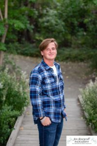 Littleton high school senior photographer at Fly'N B park in Highlands Ranch Colorado tennis and lacrosse player boy COVID pandemic sunset easy going photo session class of 2021