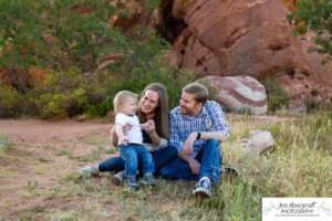 Littleton family photographer one year old boy son father mother porch session home red rocks rock formations Bradford Perley house Ken Caryl Valley toddler walking cute baby