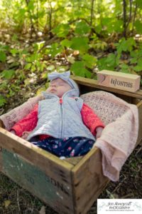 Littleton family photographer Fly'N B park Highlands Ranch fall color change trees baby girl sisters two years old water mother father daughter sleeping