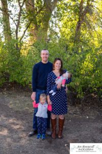 Littleton family photographer Fly'N B park Highlands Ranch fall color change trees baby girl sisters two years old water mother father daughter