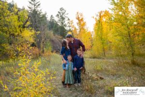 Littleton family photographer Lair O' the Bear Colorado fall Morrison yellow trees mother father son daughter big brother little sister creek love natural light photography