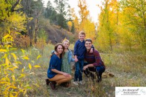 Littleton family photographer Lair O' the Bear Colorado fall Morrison yellow trees mother father son daughter big brother little sister creek love natural light photography