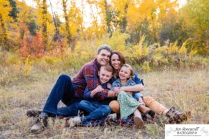 Littleton family photographer Lair O' the Bear Colorado fall Morrison yellow trees mother father son daughter big brother little sister creek love natural light photography