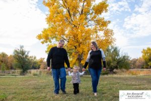 Littleton family photographer Lakewood Stone House bridge happy baby two year old mother father daughter little girl fall photography session outdoor natural light photo