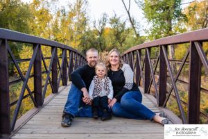 Littleton family photographer Lakewood Stone House bridge happy baby two year old mother father daughter little girl fall photography session outdoor natural light photo