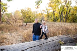 Littleton family photographer Lakewood Stone House bridge happy baby two year old mother father daughter little girl fall photography session outdoor natural light photo