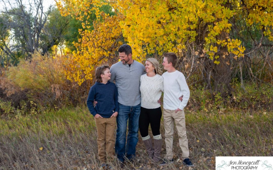 The {D} family of 4 at the Carson Nature Center along the Platte River by local Littleton photographer