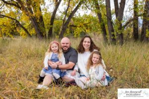 Littleton family photographer Stone House in Lakewood Colorado fall photo session sisters little girls mother father daughters bridge