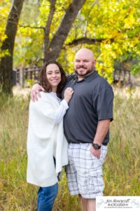 Littleton family photographer Stone House in Lakewood Colorado fall photo session sisters little girls mother father daughters bridge