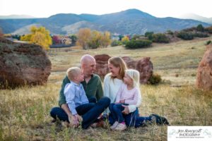 LIttleton family photographer boy girl Ken Caryl Valley red rocks rock formations fall photo session brother sister mother father parenthood sweet siblings sunset natural light photography Bradford Perley house