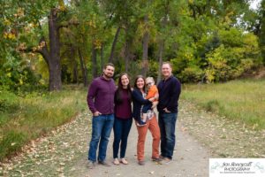 Littleton family photographer Highlands Ranch Colorado Fly'N B park fall leaves little boy mother father son kid child three years old aunt uncle trail fun natural light photography