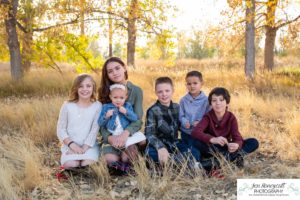 Littleton family photographer Carson Nature Center Platte River fall photo session yellow leaves six kids children mother father boys girls brothers sisters toddler foothills Colorado sunset natural light photography