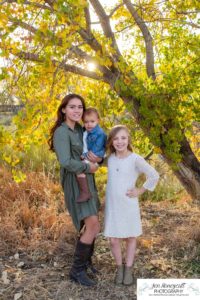 Littleton family photographer Carson Nature Center Platte River fall photo session yellow leaves six kids children mother father boys girls brothers sisters toddler foothills Colorado sunset natural light photography