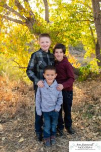 Littleton family photographer Carson Nature Center Platte River fall photo session yellow leaves six kids children mother father boys girls brothers sisters toddler foothills Colorado sunset natural light photography