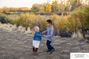 Littleton family photographer Carson Nature Center Platte River fall photo session yellow leaves six kids children mother father boys girls brothers sisters toddler foothills Colorado sunset natural light photography