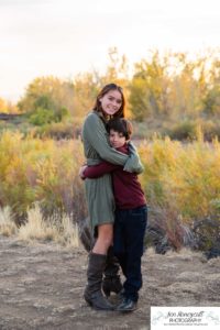 Littleton family photographer Carson Nature Center Platte River fall photo session yellow leaves six kids children mother father boys girls brothers sisters toddler foothills Colorado sunset natural light photography
