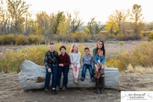 Littleton family photographer Carson Nature Center Platte River fall photo session yellow leaves six kids children mother father boys girls brothers sisters toddler foothills Colorado sunset natural light photography