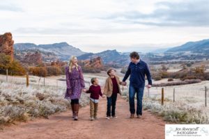 Littleton family photographer in Colorado South Valley Open Space park Ken Caryl red rocks rock formations boys brothers fall photo session cold frost winter mother father sons sunset photography