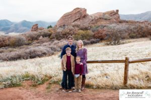 Littleton family photographer in Colorado South Valley Open Space park Ken Caryl red rocks rock formations boys brothers fall photo session cold frost winter mother father sons sunset photography