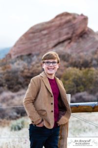 Littleton family photographer in Colorado South Valley Open Space park Ken Caryl red rocks rock formations boys brothers fall photo session cold frost winter mother father sons sunset photography