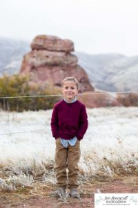 Littleton family photographer in Colorado South Valley Open Space park Ken Caryl red rocks rock formations boys brothers fall photo session cold frost winter mother father sons sunset photography