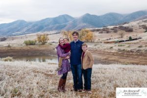 Littleton family photographer in Colorado South Valley Open Space park Ken Caryl red rocks rock formations boys brothers fall photo session cold frost winter mother father sons sunset photography