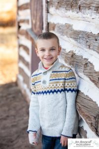 Littleton family photographer Hildebrand Ranch Colorado farm barn boy girl siblings brother sister mother father sunset golden natural light photography foothills view children kids broken arm