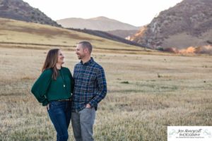 Littleton family photographer Hildebrand Ranch Colorado farm barn boy girl siblings brother sister mother father sunset golden natural light photography foothills view children kids broken arm