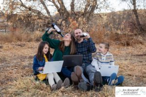 Littleton family photographer Hildebrand Ranch Colorado farm barn boy girl siblings brother sister mother father sunset golden natural light photography foothills view children kids broken arm