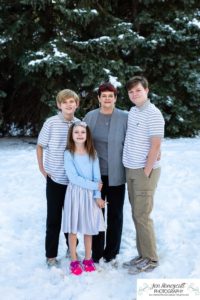 Littleton family photographer snow photo session Morrison pine trees snowy winter Thanksgiving extended grandmother grandchildren visit from Arizona