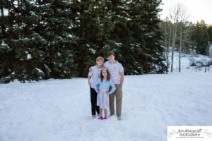 Littleton family photographer snow photo session Morrison pine trees snowy winter Thanksgiving extended grandmother grandchildren visit from Arizona