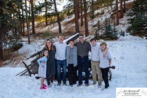 Littleton family photographer snow photo session Morrison pine trees snowy winter Thanksgiving extended grandmother grandchildren visit from Arizona