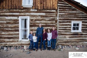 Littleton family photographer Clear Creek History park Golden Colorado snow winter big kids children siblings bridge Christmas cute fun barns sunset photography