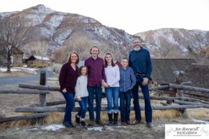 Littleton family photographer Clear Creek History park Golden Colorado snow winter big kids children siblings bridge Christmas cute fun barns sunset photography