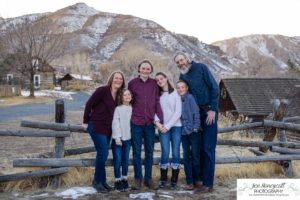 Littleton family photographer Clear Creek History park Golden Colorado snow winter big kids children siblings bridge Christmas cute fun barns sunset photography