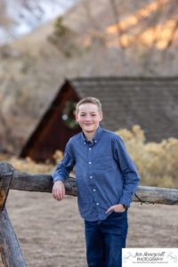 Littleton family photographer Clear Creek History park Golden Colorado snow winter big kids children siblings bridge Christmas cute fun barns sunset photography