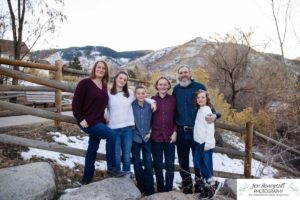 Littleton family photographer Clear Creek History park Golden Colorado snow winter big kids children siblings bridge Christmas cute fun barns sunset photography