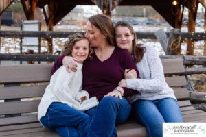 Littleton family photographer Clear Creek History park Golden Colorado snow winter big kids children siblings bridge Christmas cute fun barns sunset photography