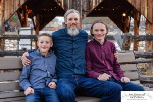 Littleton family photographer Clear Creek History park Golden Colorado snow winter big kids children siblings bridge Christmas cute fun barns sunset photography