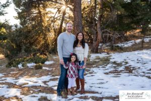 Littleton family photographer child kid daughter snow winter Mt. Falcon golden hour sunset natural light photography