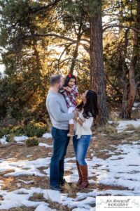 Littleton family photographer child kid daughter snow winter Mt. Falcon golden hour sunset natural light photography