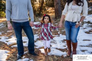 Littleton family photographer child kid daughter snow winter Mt. Falcon golden hour sunset natural light photography