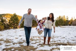 Littleton family photographer child kid daughter snow winter Mt. Falcon golden hour sunset natural light photography