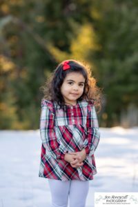 Littleton family photographer child kid daughter snow winter Mt. Falcon golden hour sunset natural light photography