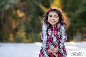 Littleton family photographer child kid daughter snow winter Mt. Falcon golden hour sunset natural light photography