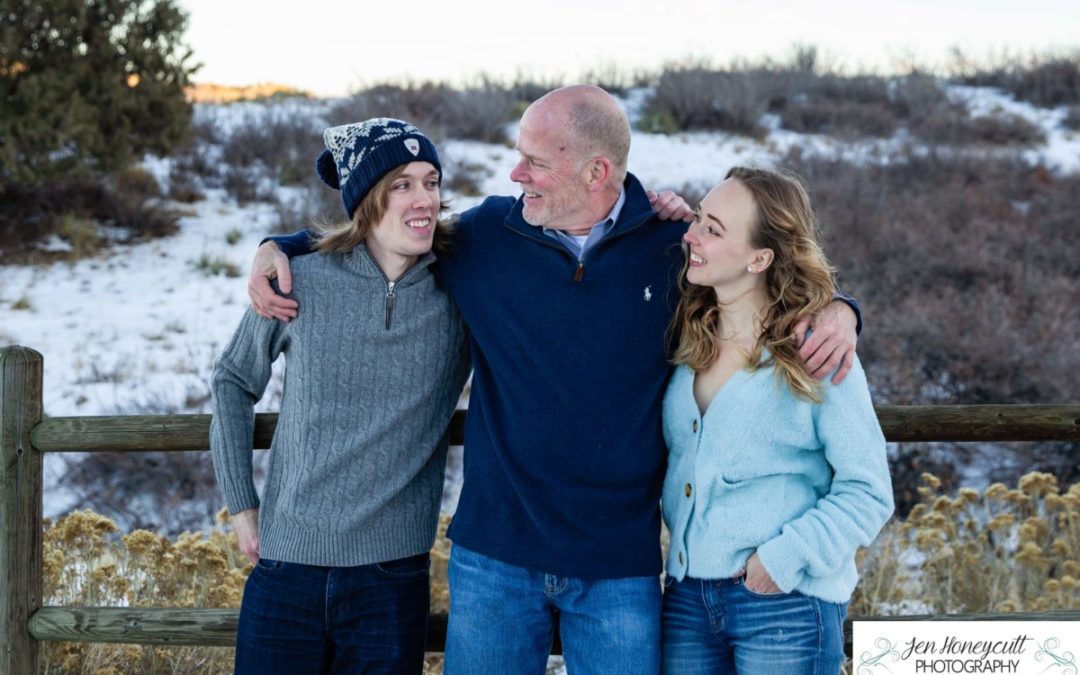 The {T} family of 3 in the snow at Deer Creek Canyon by local Littleton photographer