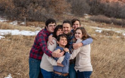 The {S} family of 6 at South Valley Open Space park in the Ken Caryl Valley by local Littleton photographer
