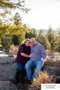 Littleton engagement photographer Mt. Falcon in love husband wife engaged mr. and mrs. mountains Colorado April wedding future marriage married diamond ring photography sunset