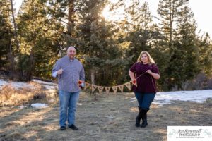 Littleton engagement photographer Mt. Falcon in love husband wife engaged mr. and mrs. mountains Colorado April wedding future marriage married diamond ring photography sunset